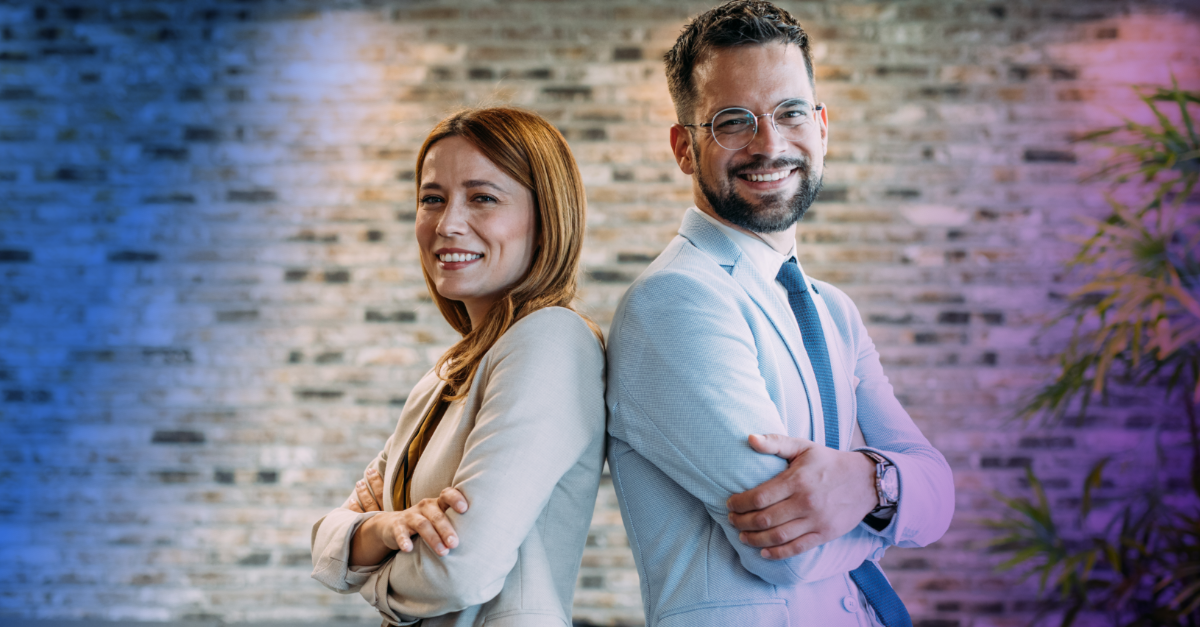 Two salespeople standing next to each other